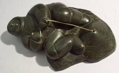 Hunter Pulling Harpoon Line