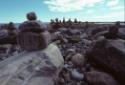 An area of many shapes of inuksuit in the Arviat area. 
Keewatin, Nunavut, 1970

The Norman …
