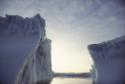 Icebergs out to sea from Kinngait (Cape Dorset). 
Southwest Baffin Island, Nunavut, 1992

Th…
