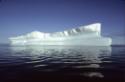 Icebergs out to sea from Kinngait (Cape Dorset). 
Southwest Baffin Island, Nunavut, 1992

Th…