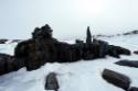 Inuksuit on a small island at Itilliarjuk.
Southwest Baffin Island, Nunavut, 1995

The Norma…